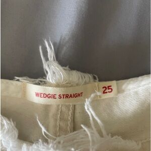 Brand new no tags Levis women ripped waist wedge jeans